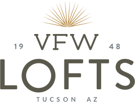 A logo with the text VFW LOFTS in front of a sunburst graphic.